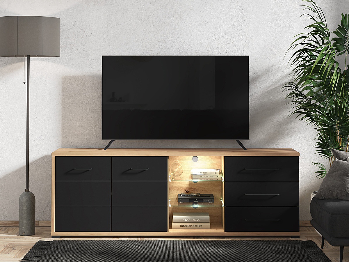 Tv stolík 190 s kompletným osvetlením lugano - dub artisan/čierna.

TV stolík Lugano je skvelou voľbou pre umiestnenie televízora v obývačke.

 

Rozmery TV stolíka 190 s kompletným osvetlením Lugano sú 190x65x40cm (š, v, h).

 

Všetky produkty z kolekcie Lugano nájdete nižšie v súvisiacich produktoch.