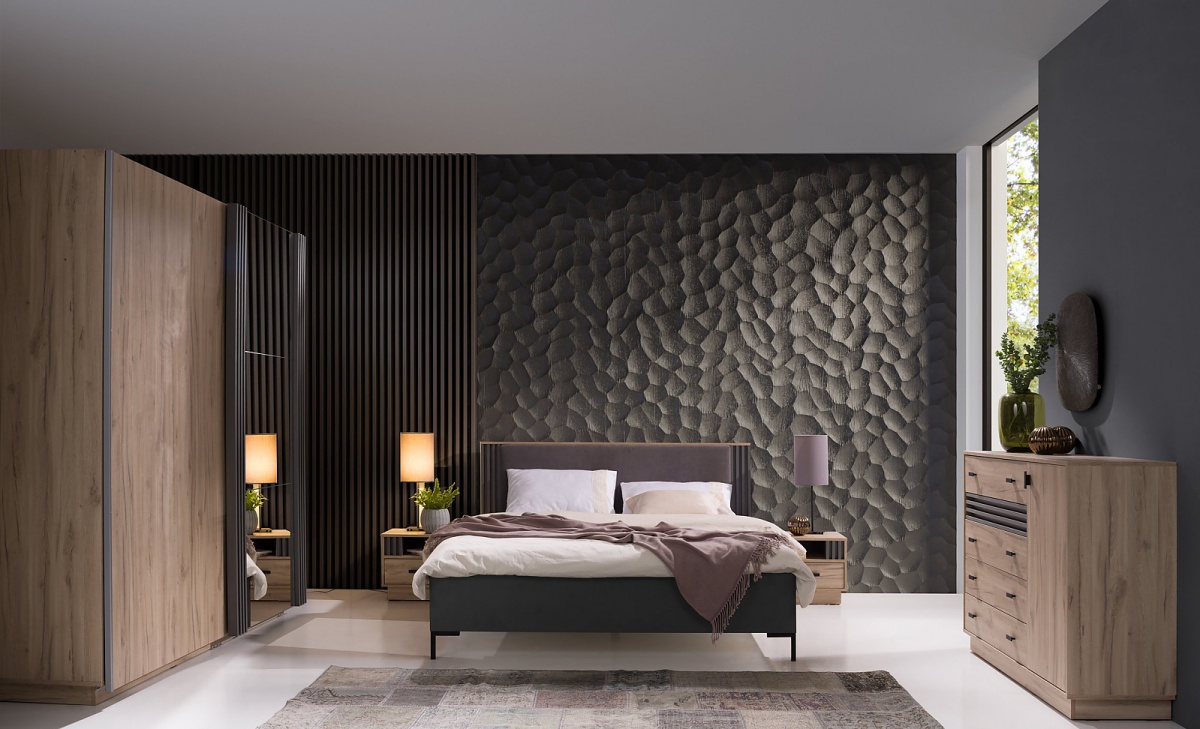 Spálňa i eliot - dub estana/šedá.

 

Luxusná a predovšetkým pohodlná manželská posteľ je základom každej spálne.

 

Kombinovaná komoda je najlepšou možnou voľbou, ktorú si možno z kategórie skriniek zaobstarať.

 

Moderný nočný stolík v dvoch prevedeniach - v pravom a ľavom, ktorý perfektne doladí Vašu spálňu.

 

Priestranná šatníková skriňa sa vždy hodí.

 

Spálňa I sa skladá z týchto prvkov:


	Manželská posteľ 160x200cm Eliot - 168x94,5x208cm (š, v, h)
	Kombinovaná komoda Eliot - 135x95x40cm (š, v, h)
	Nočný stolík pravý + ľavý Eliot - 40x40x36cm (š, v, h)
	Skriňa s posuvnými dverami a zrkadlom Eliot – 215x210x61cm (š, v, h)


 

Všetky produkty z kolekcie Eliot nájdete nižšie v súvisiacich produktoch.