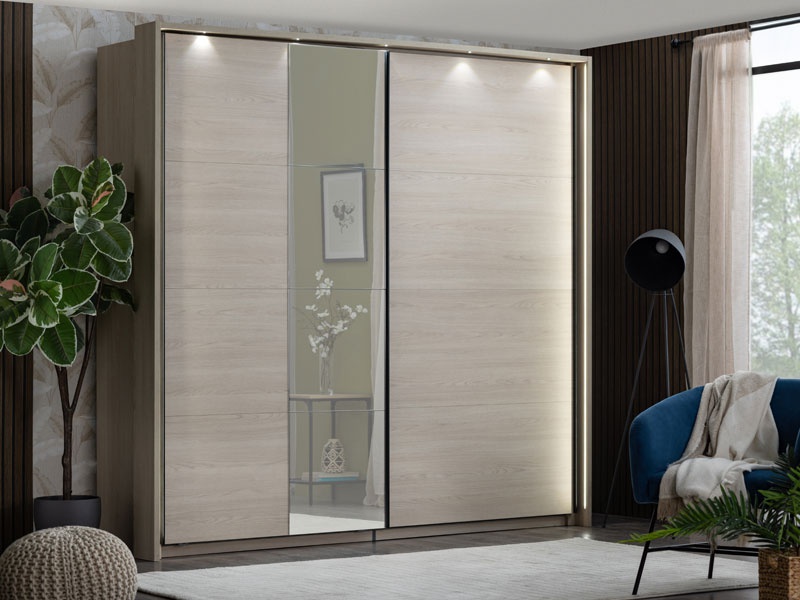 Šatníková skriňa s posuvnými dverami a zrkadlom anita - dub svetlý.

 

Objavte čaro šatníkovej skrine Anita, ktorá sa stane nepostrádateľnou súčasťou vašej spálne.

 

Tento model si možno prispôsobiť podľa individuálnych potrieb, a to napríklad inštaláciou rámu s LED osvetlením (alebo bez), dodatočných políc a zásuviek pre lepšiu organizáciu a prehľadnosť, alebo aj pridanie spomaľovača posuvných dverí pre plynulé zatváranie.

 

Výhody:


	Posuvné dvere: Jednoduché otváranie a zatváranie bez potreby ďalšieho priestoru.
	Zrkadlo: Umiestnené v ľavej prednej časti dverí, opticky zväčšuje priestor a pridáva miestnosti na svetelnosti.
	Dekor svetlého portského duba: Prináša do interiéru pocit tepla a elegancie.
	Možnosť prispôsobenia: Upravte si skriňu podľa svojich potrieb a preferencií.
	Kvalitné materiály a spracovanie: Zaručujú dlhú životnosť a spokojnosť s produktom.


 

Pevnosť a stabilitu konštrukcie zabezpečuje lamino o hrúbke 16mm, zadná strana je potom tvorená 3mm sololitom.

 

*ABS hrany = prúžky slúžiace na olepenie a ochranu hrán nábytkových dosiek
*MDF doska = ľahko opracovateľný drevovláknitý materiál so širokým spektrom možných úprav využívaný napr.

 

Šatníková skriňa Anita je súčasťou rovnomennej kolekcie Anita, čo umožňuje jednoduchú kombináciu s ďalšími prvkami tejto rady pre jednotný a harmonický vzhľad vašej spálne.

 

Prineste do svojho domova kúsok elegancie a pohodlia s touto úžasnou šatníkovou skriňou!

 

Rozmery šatníkovej skrine Anita sú 220x217,5x61cm (š, v, h).

 

Ďalšie produkty z kolekcie Anita a dodatočné produkty k tejto skrini nájdete nižšie v súvisiacich produktoch.